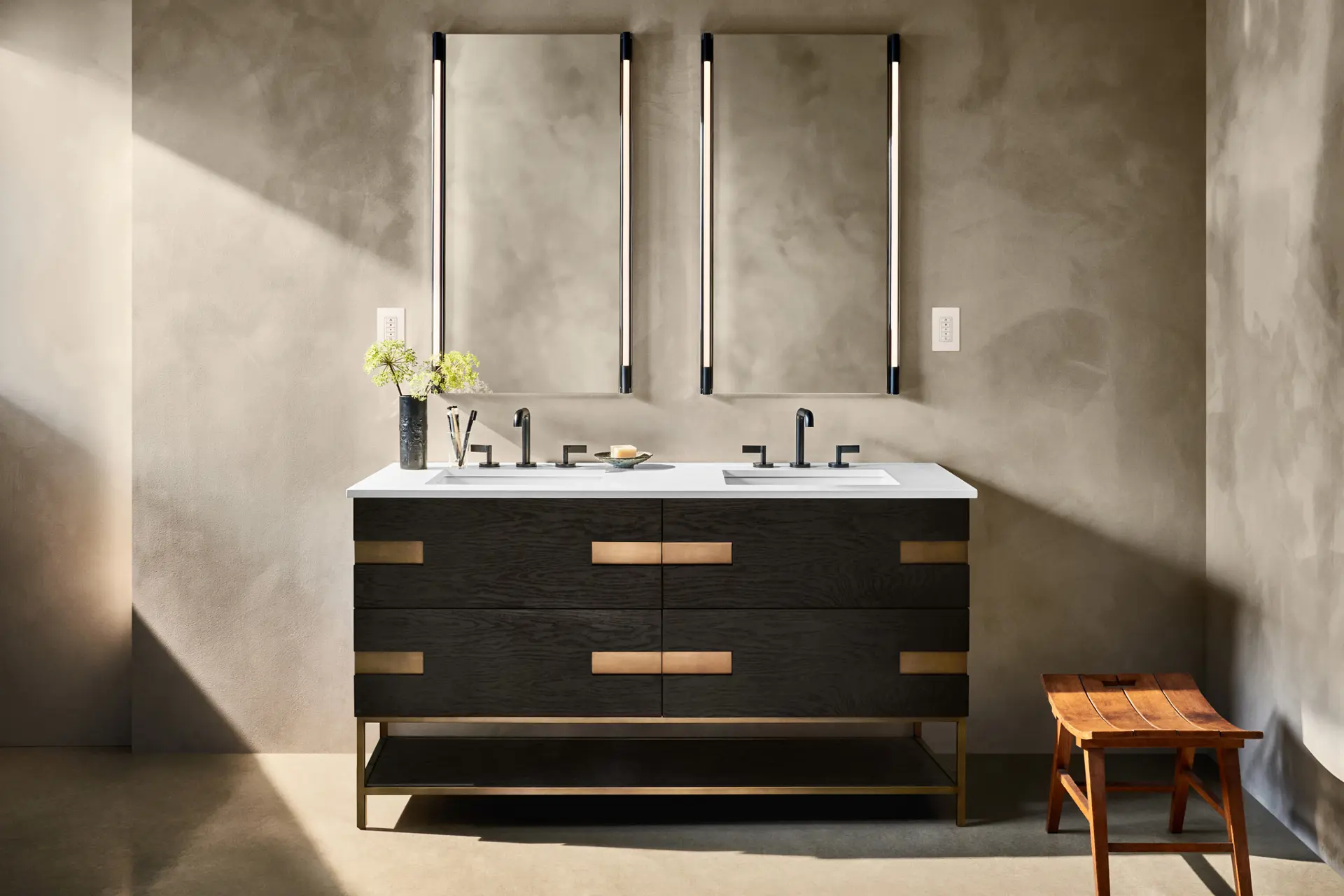 modern luxury bathroom black vanity with metallic accents